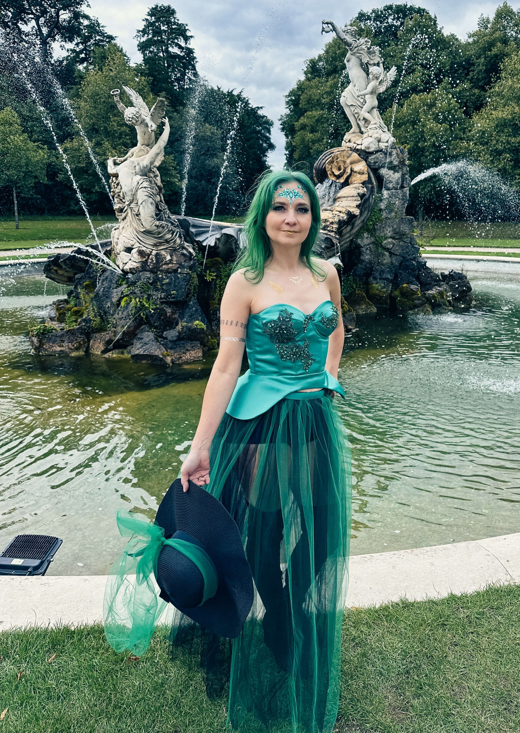 Renata Rimke wearing green gown dress